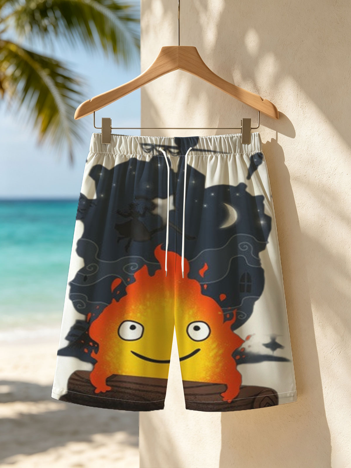Cute Flame Character with Night Sky and Witch Silhouette Background -  Beach shorts