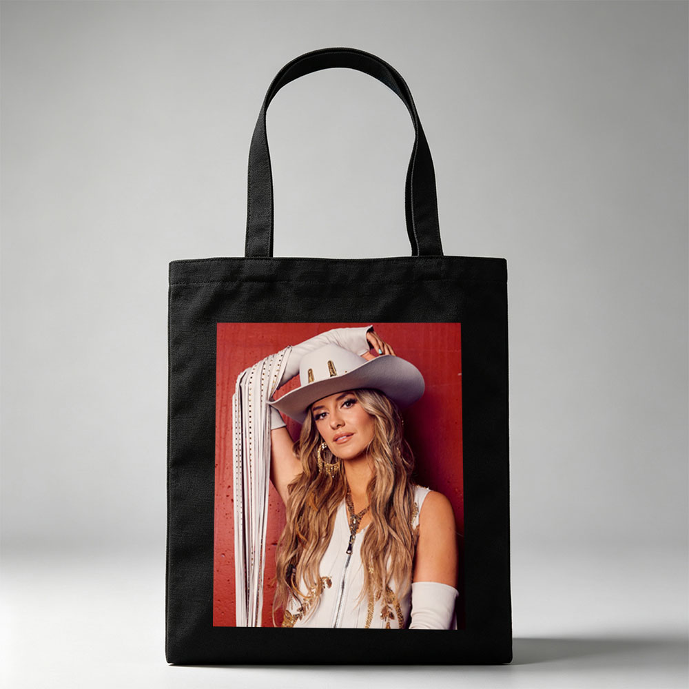 Lindsay Ell in a Cowboy Hat and Western Outfit Against a Red Background - Canvas tote bags