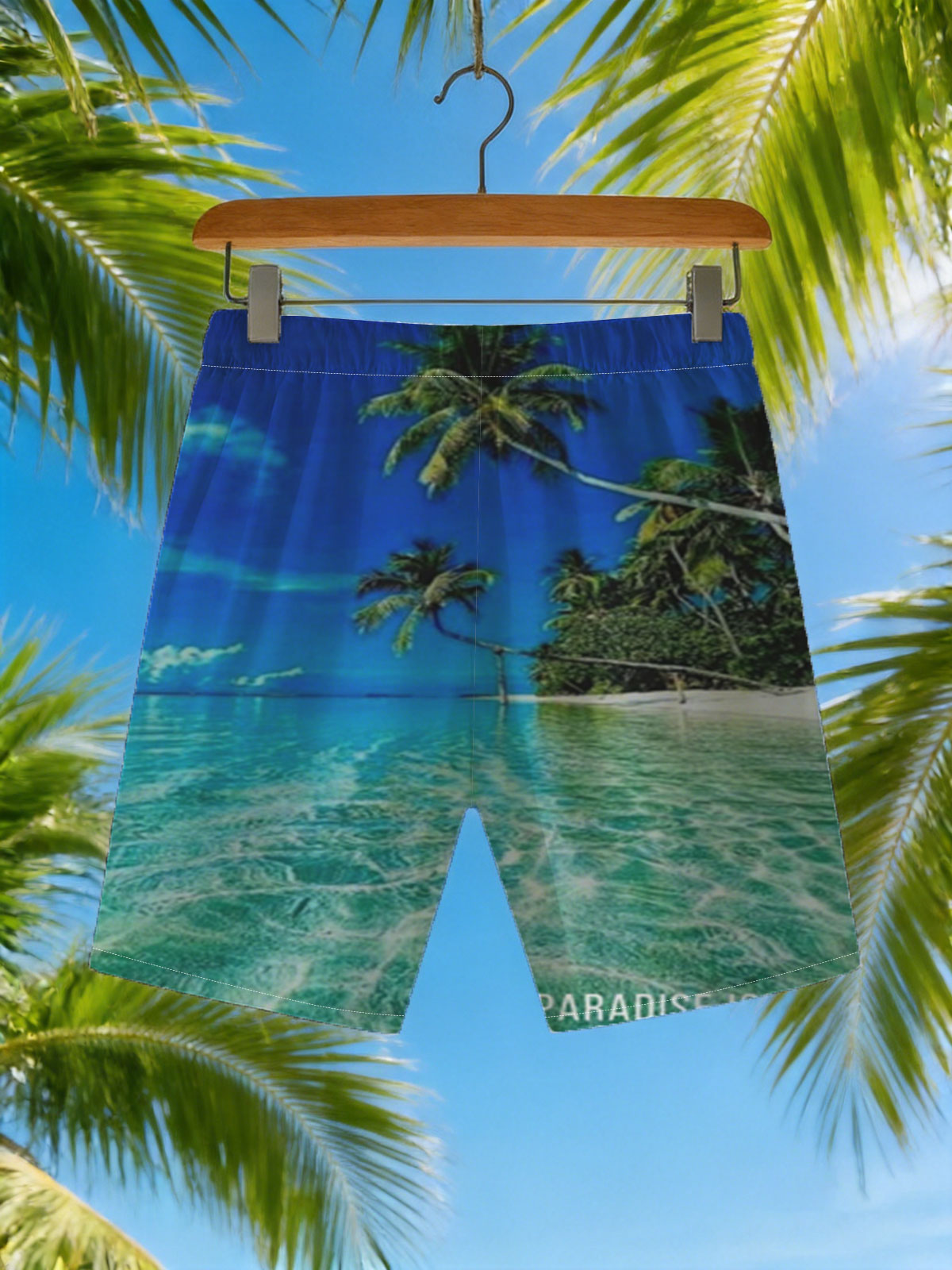 Crystal clear waters and swaying palms on a tropical paradise island under a vibrant blue sky. -  Beach shorts