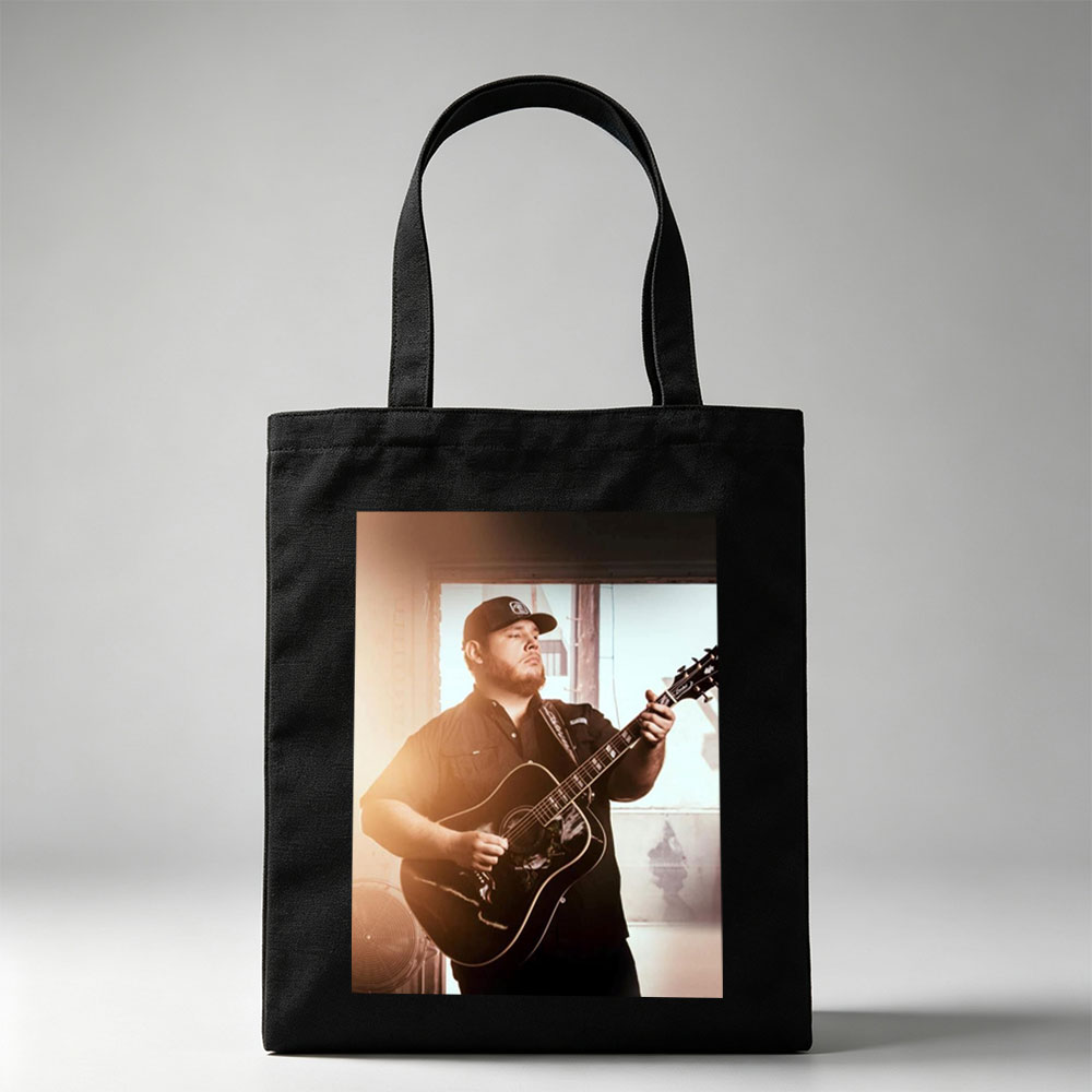 Luke Combs Playing Acoustic Guitar in a Sunlit Room - Canvas tote bags