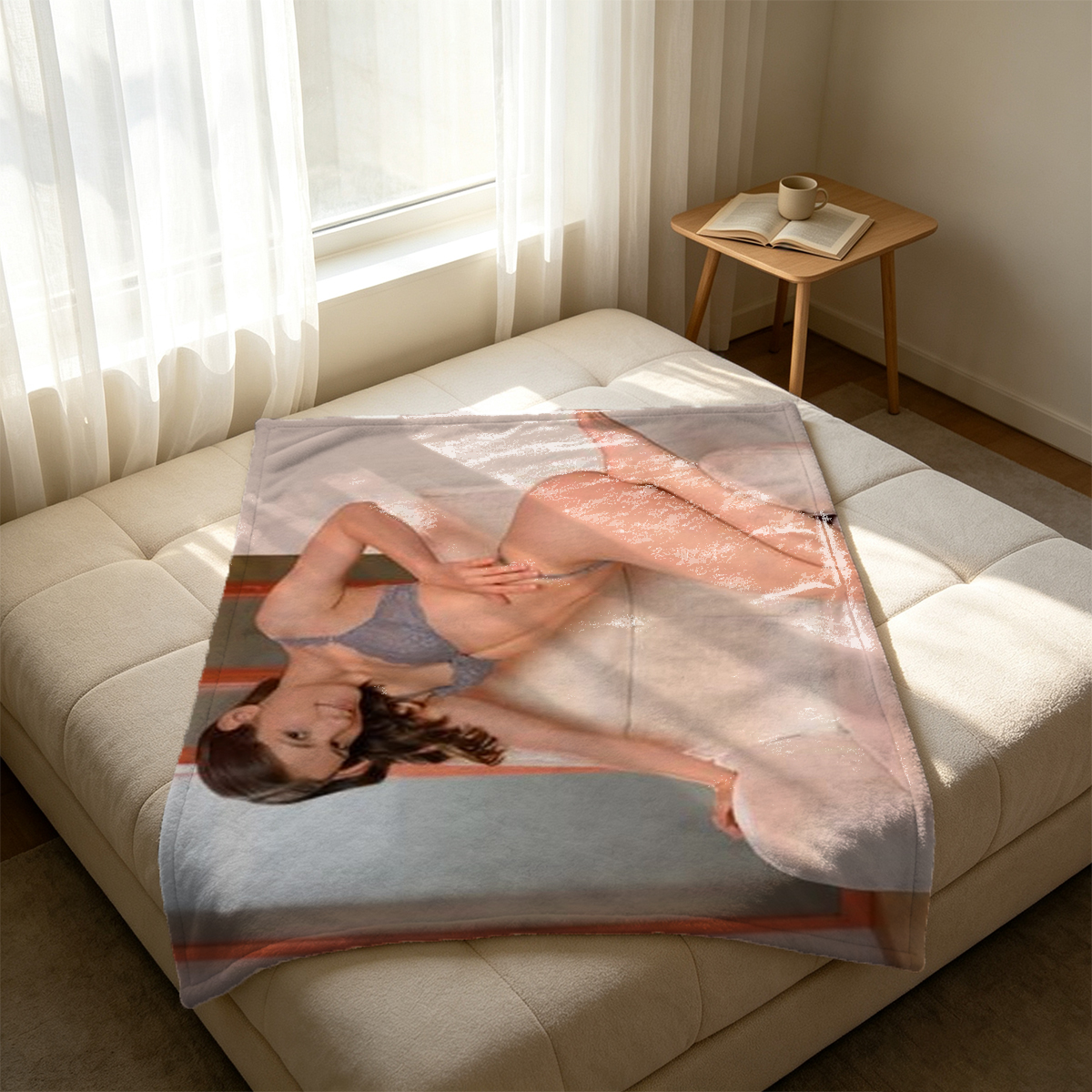 Blonde woman in pink one-piece swimsuit on luxury balcony overlooking ocean and coastal village. - Blanket