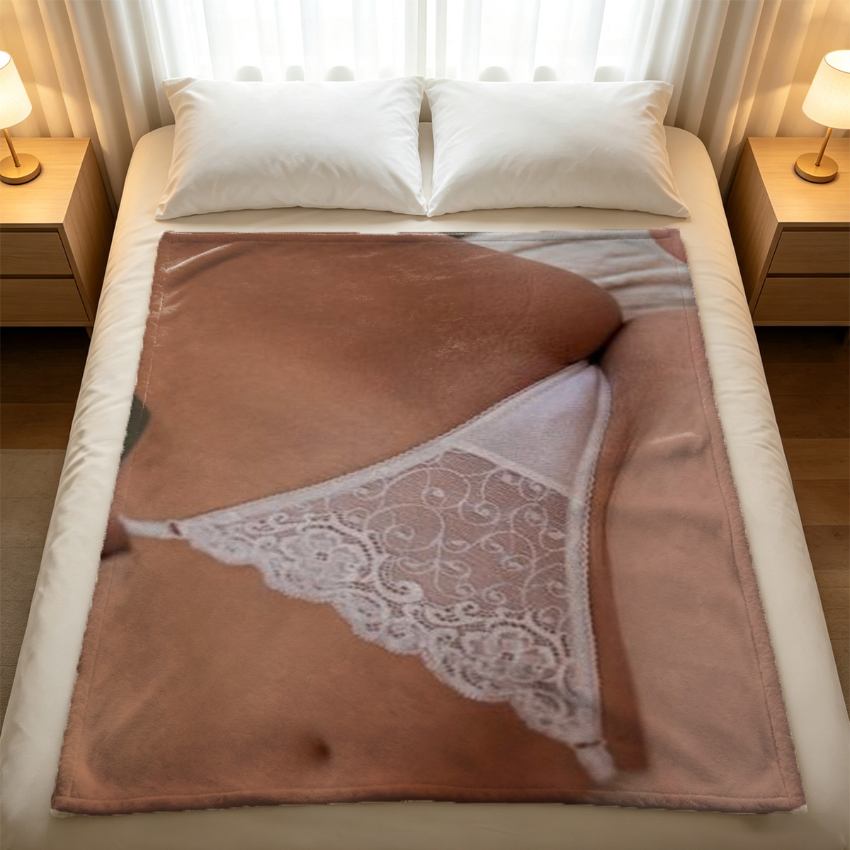 Blonde woman in black lace lingerie kneeling on bed - Blanket