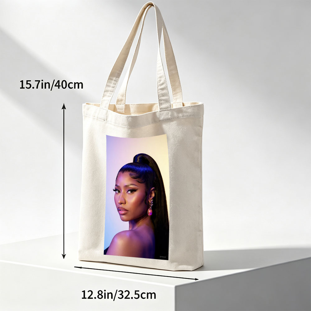 Nicki Minaj in a Stunning Portrait with Bold Makeup and High Ponytail Under Purple Lighting - Canvas tote bags