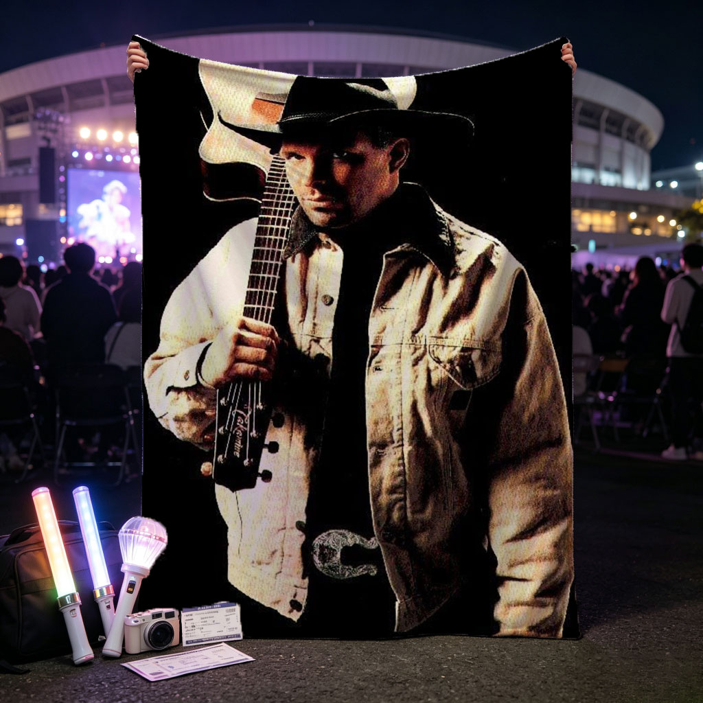 Garth Brook Holding Acoustic Guitar in Cowboy Attire Against Dark Background - Blankets