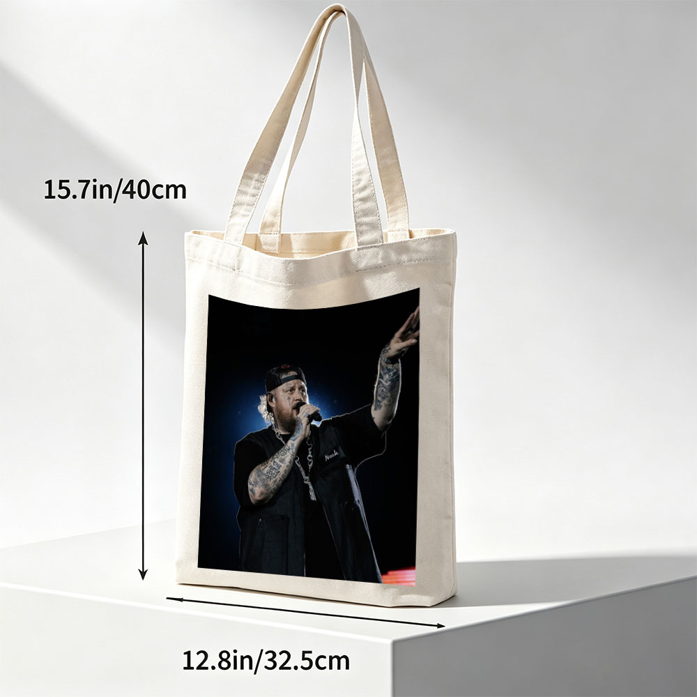 Jelly Roll Performing on Stage with Microphone and Tattooed Arms - Canvas tote bags