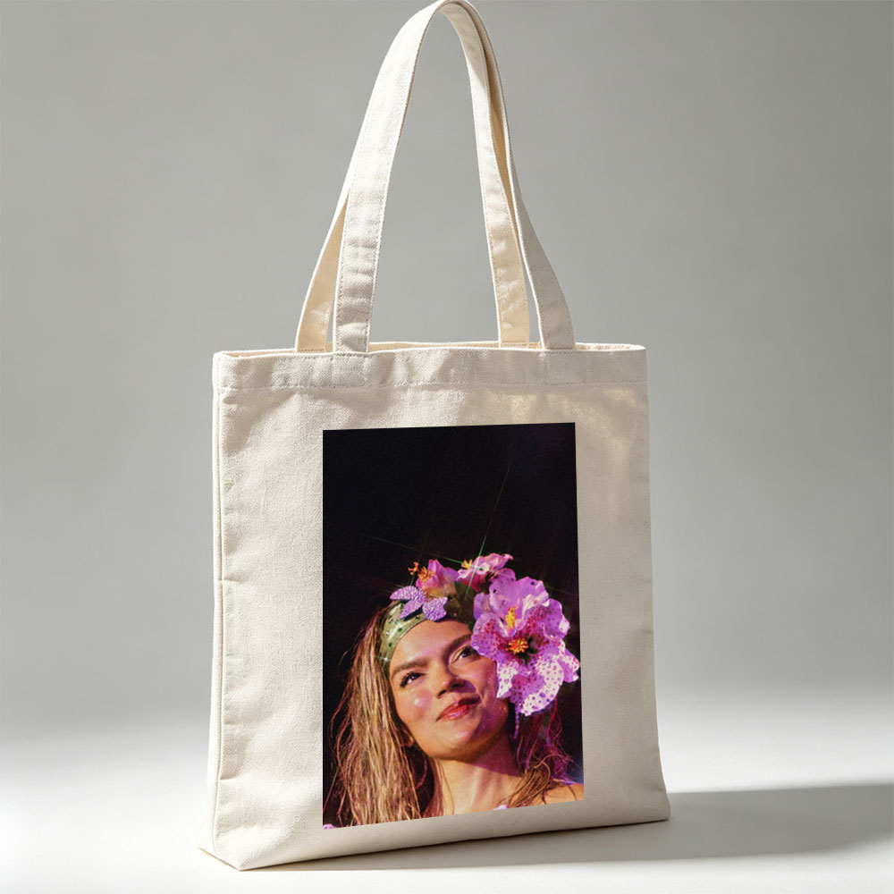 Rita Ora Wearing a Floral Headpiece at a Performance - Canvas tote bags