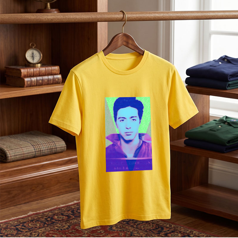 A stylized portrait of a man with vibrant, colorful lighting and geometric overlays. - Tee