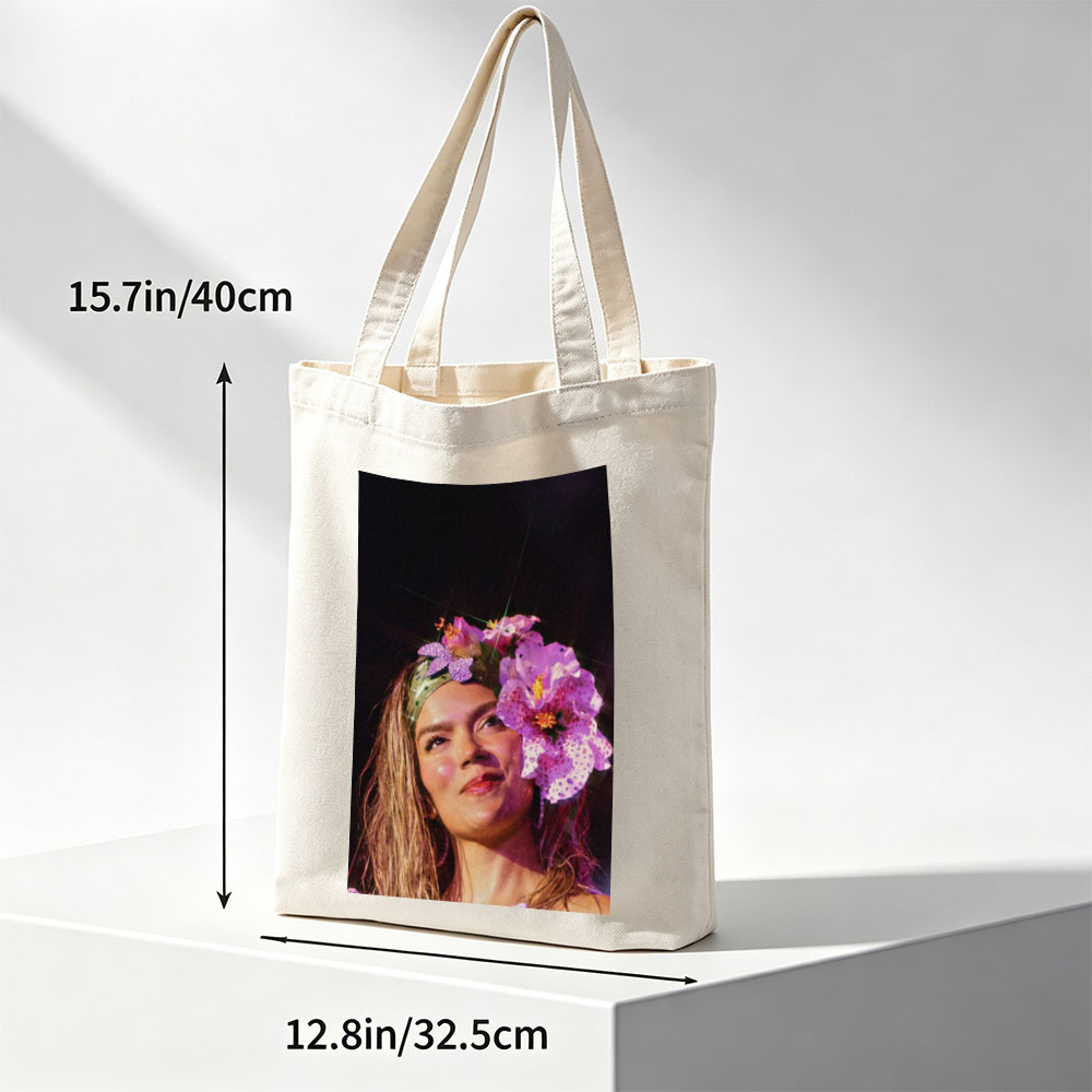 Rita Ora Wearing a Floral Headpiece at a Performance - Canvas tote bags