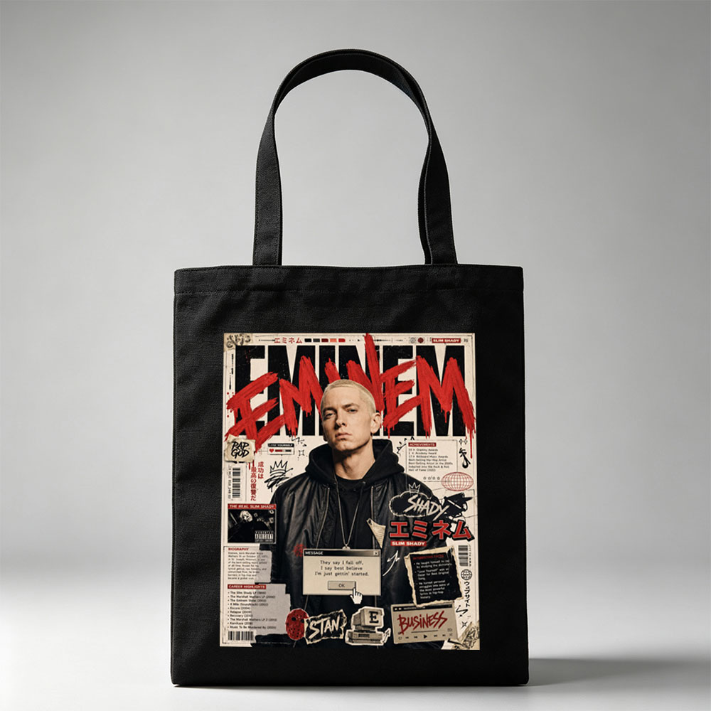Eminem on a vibrant magazine cover featuring bold red text, career highlights, and iconic album references. - Canvas tote bags