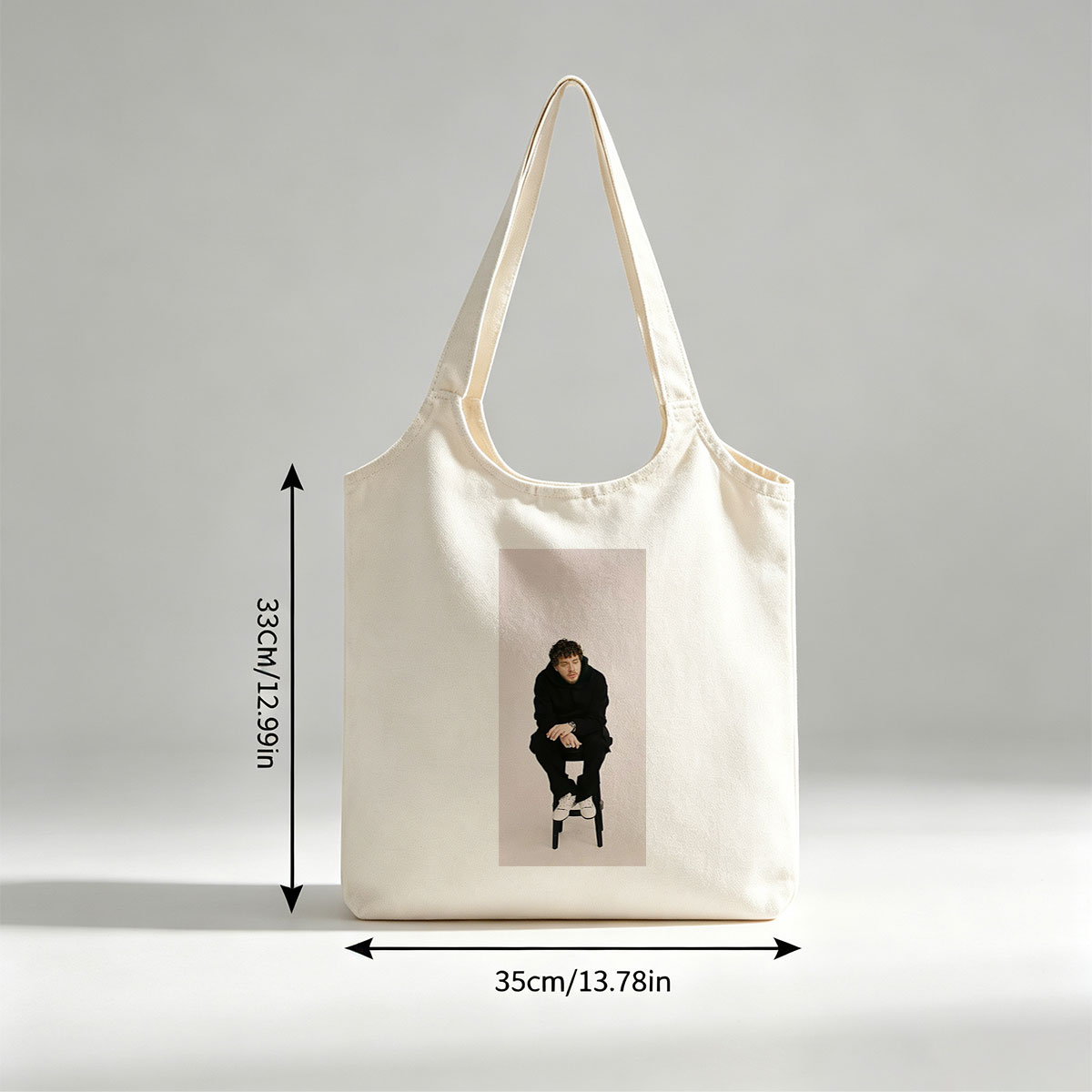 Lauv Sitting on a Stool Wearing All Black Outfit and White Sneakers - Canvas shoulder bags/