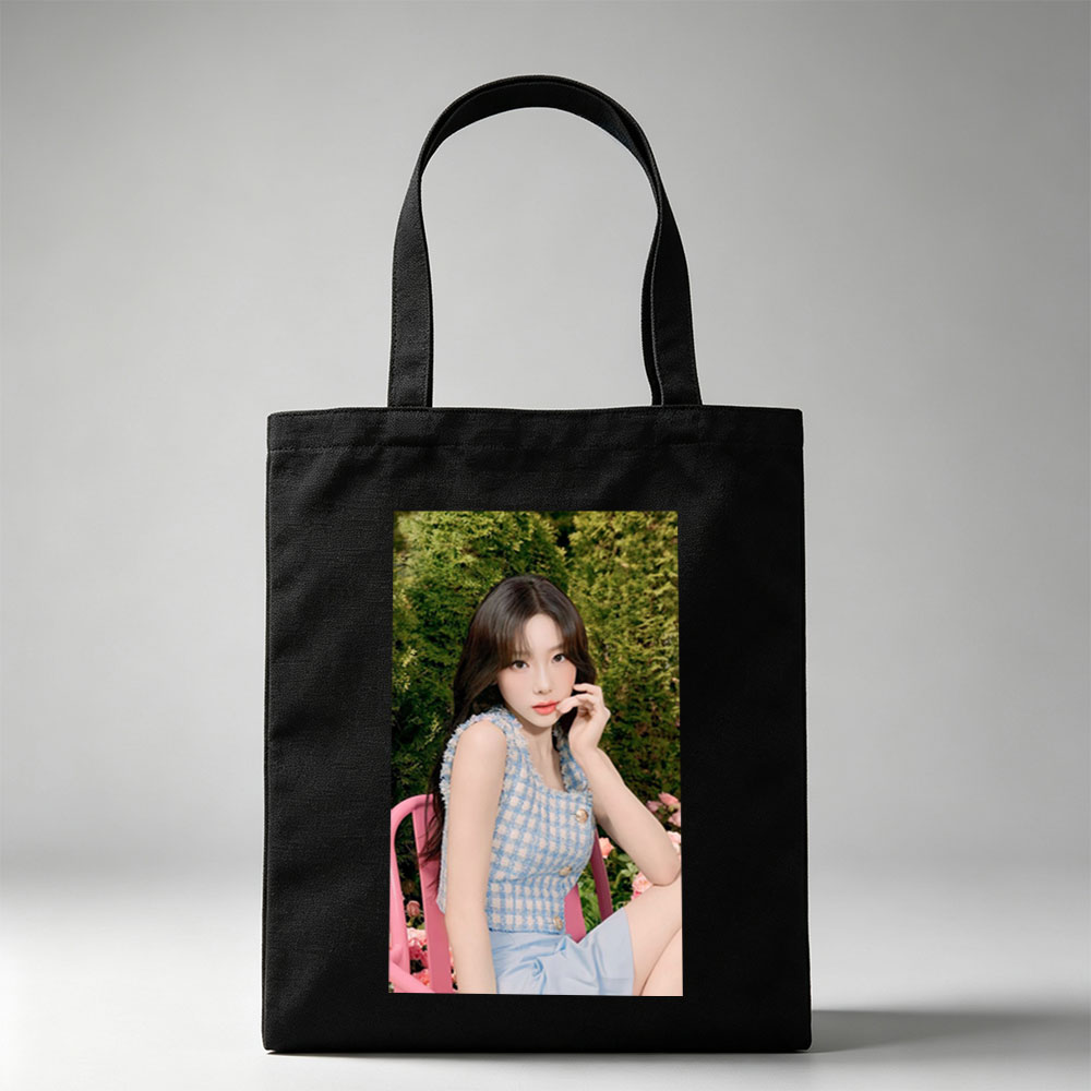 Tzuyu in a Garden Scene Wearing a Blue Checkered Top and Light Blue Skirt, Sitting on a Pink Chair Amidst Greenery and Flowers - Canvas tote bags
