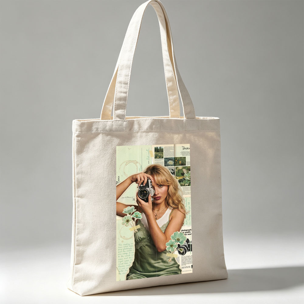 Margot Robbie Holding a Vintage Camera in a Collage-Style Portrait with Floral Elements and Photography Text Background - Canvas tote bags
