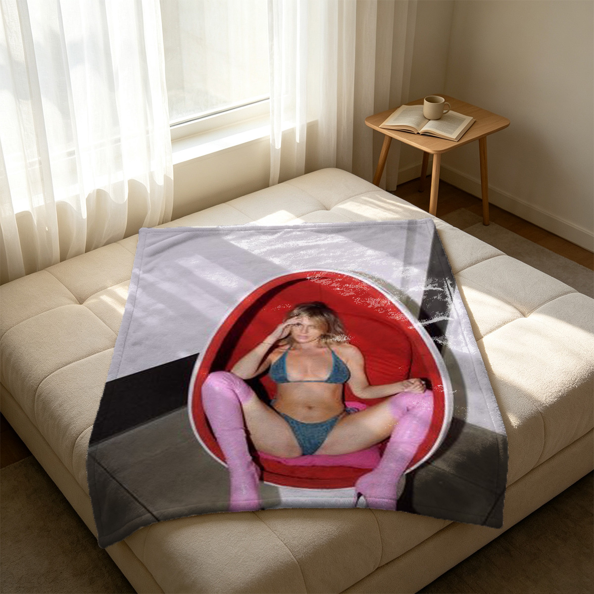 Two Women in Pink Lingerie Reading a Book on a Couch - Blanket