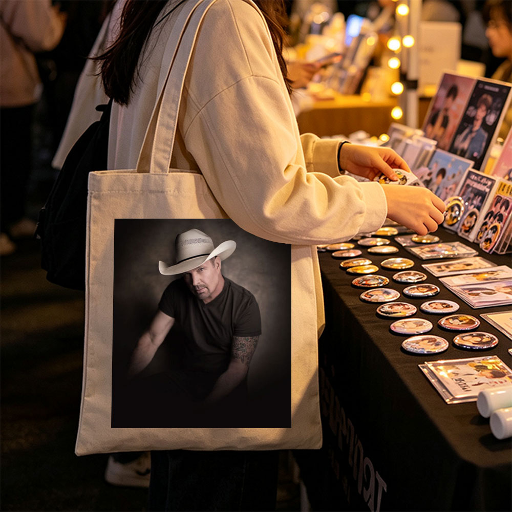 Tim McGraw in a Cowboy Hat - Intense Portrait with Tattooed Arm and Dark Background - Canvas tote bags