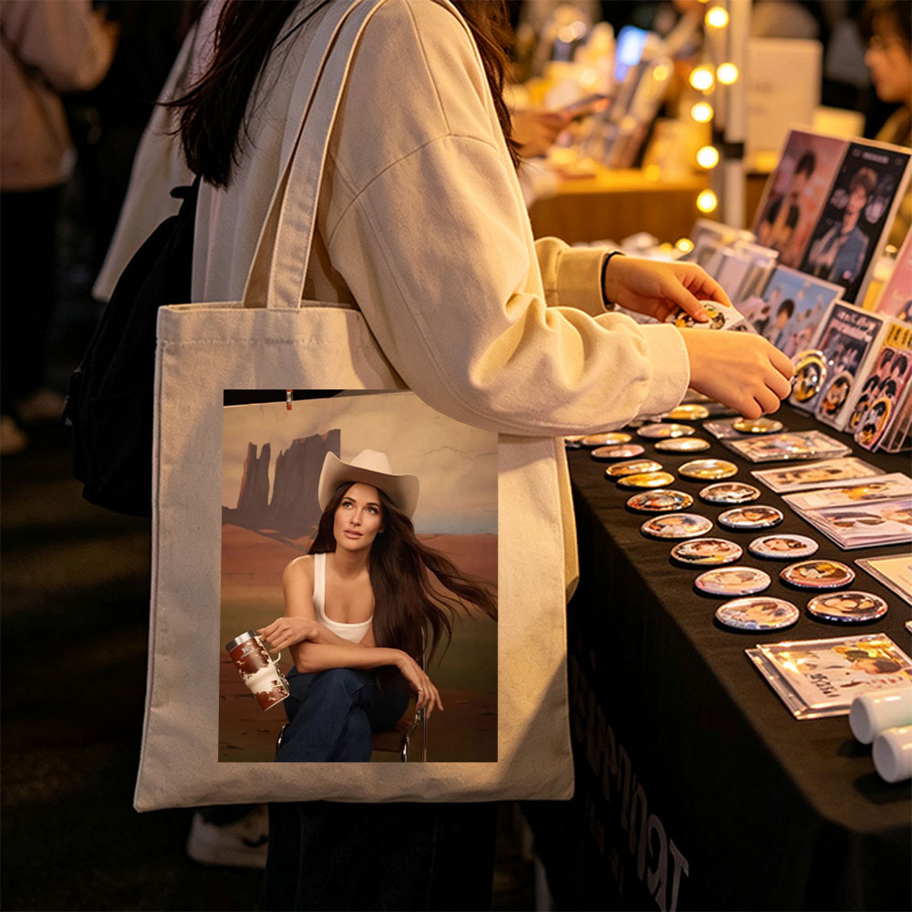 Jennifer Lopez in Cowboy Hat Holding a Mug Against Desert Backdrop - Canvas tote bags