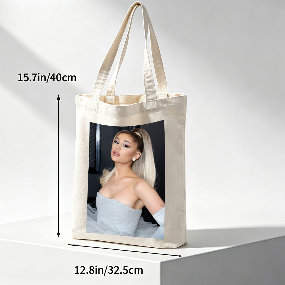 Ariana Grande at a Red Carpet Event Wearing a Light Blue Strapless Gown with Tulle Skirt and High Ponytail Hairstyle - Canvas tote bags