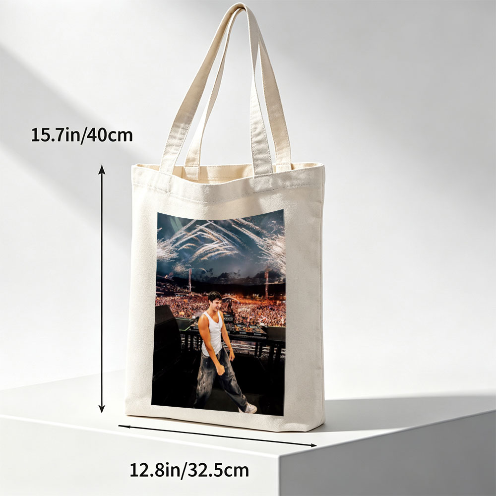 Martin Garrix Live Performance at Festival with Fireworks and Crowd in Background - Canvas tote bags