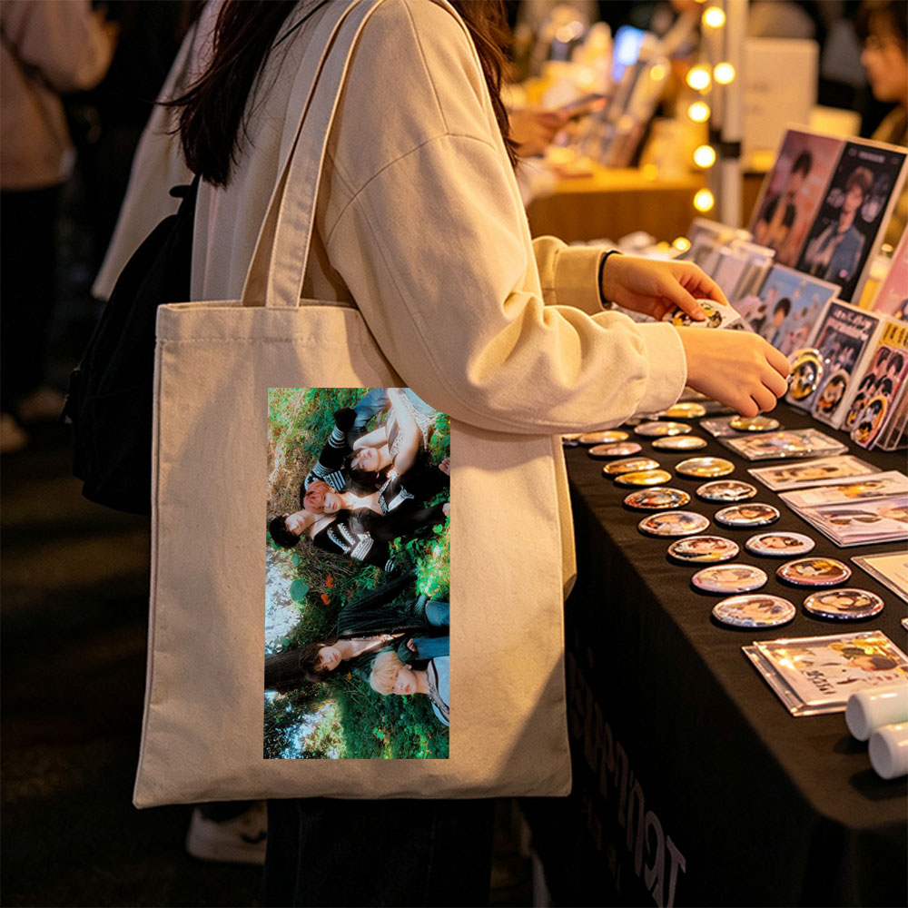 TXT Members Lying on Grass in Nature Scene - Canvas tote bags