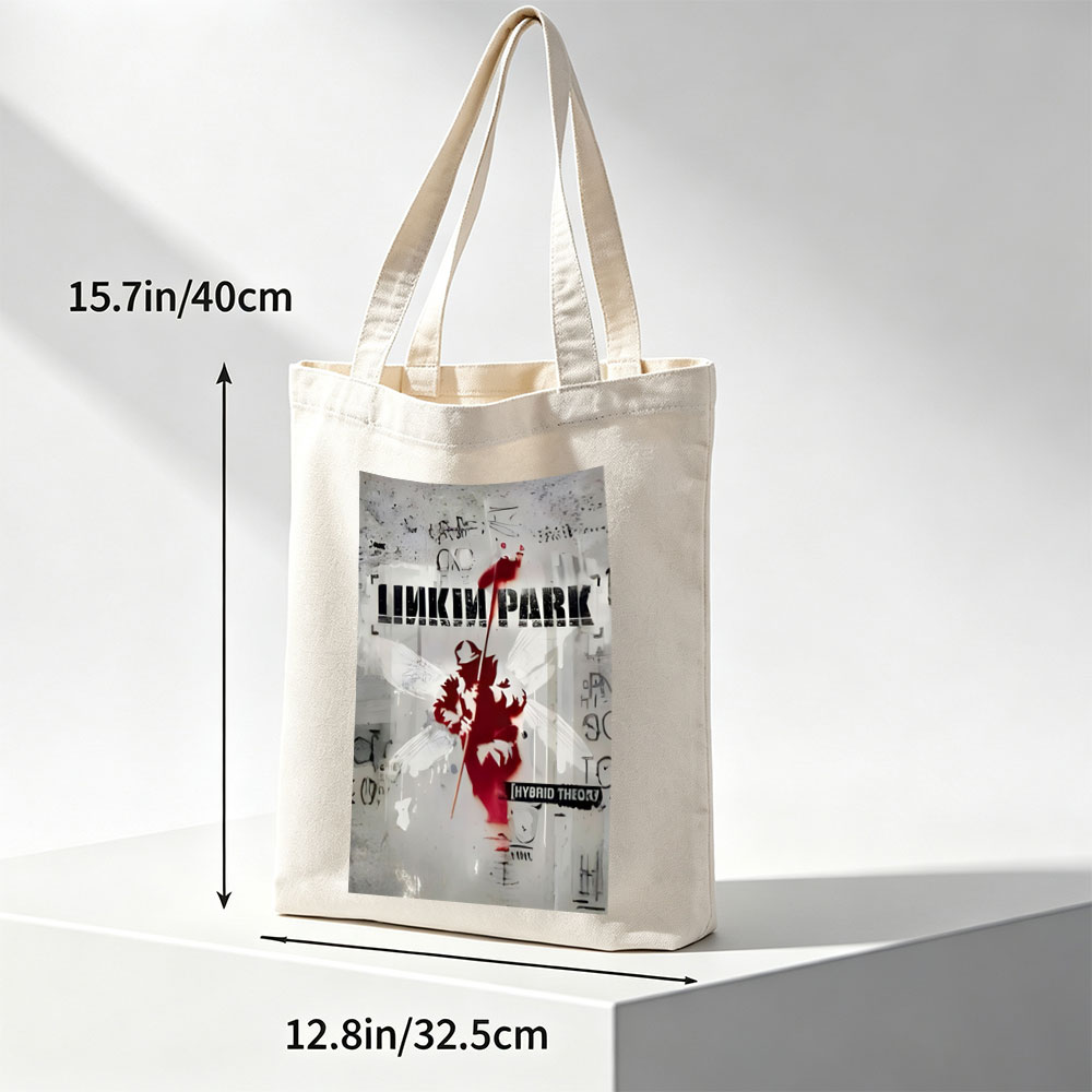 Linkin Park Album Cover Featuring a Red Silhouette of an Angel with Wings and a Spear Against a Graffiti-Style Background - Canvas tote bags