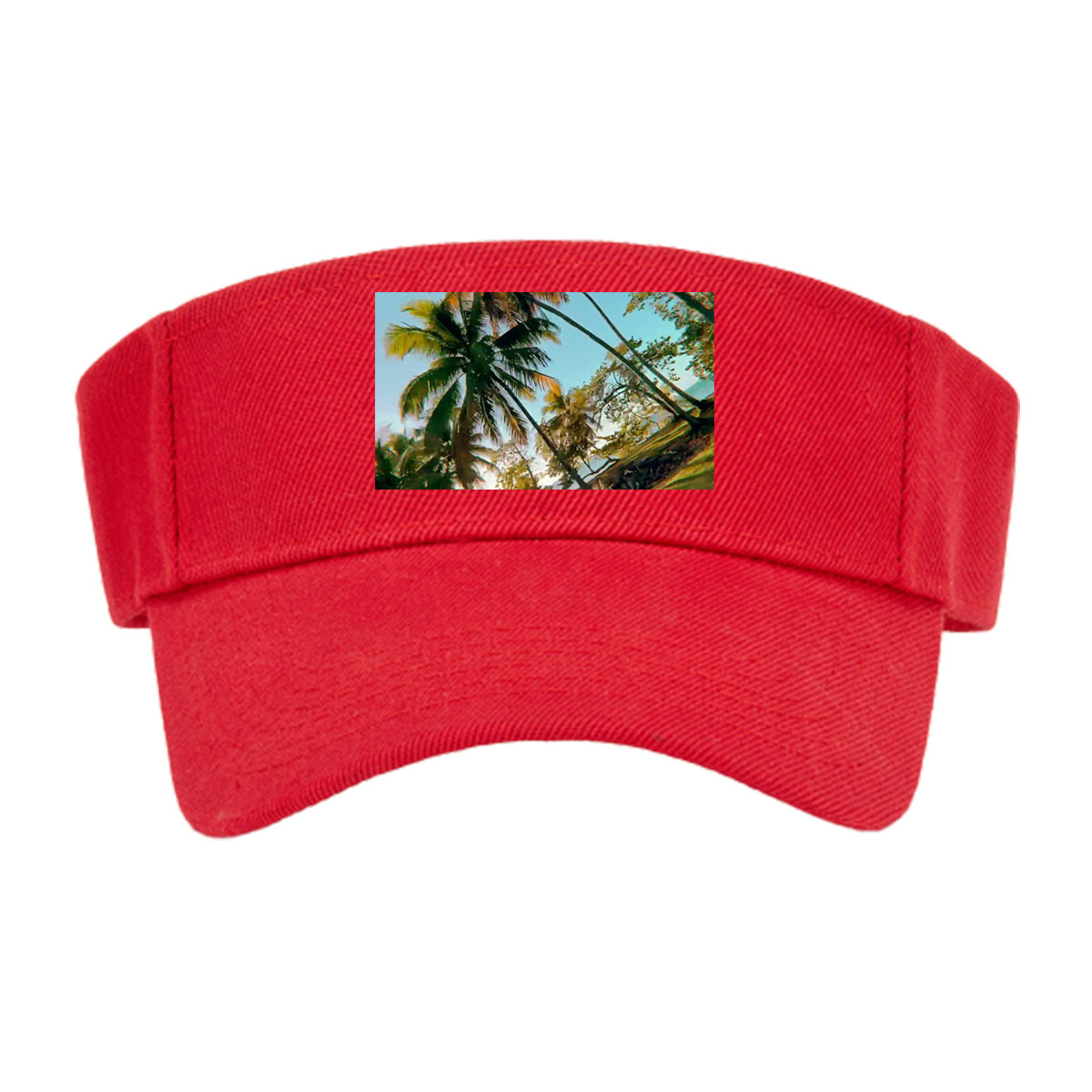 Tropical palm trees sway under a clear blue sky, casting golden shadows on the ground. -  Visor cap
