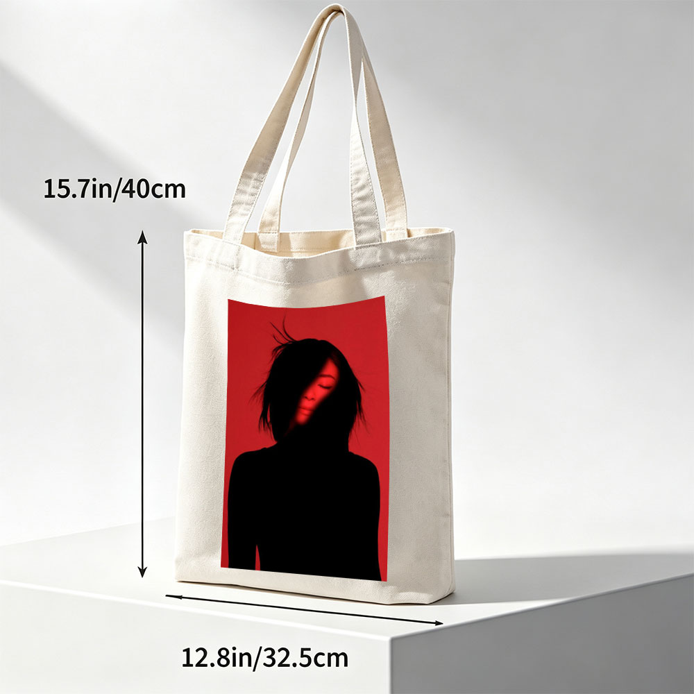Billie Eilish in a Dramatic Red-Lit Portrait with Silhouetted Features - Canvas tote bags