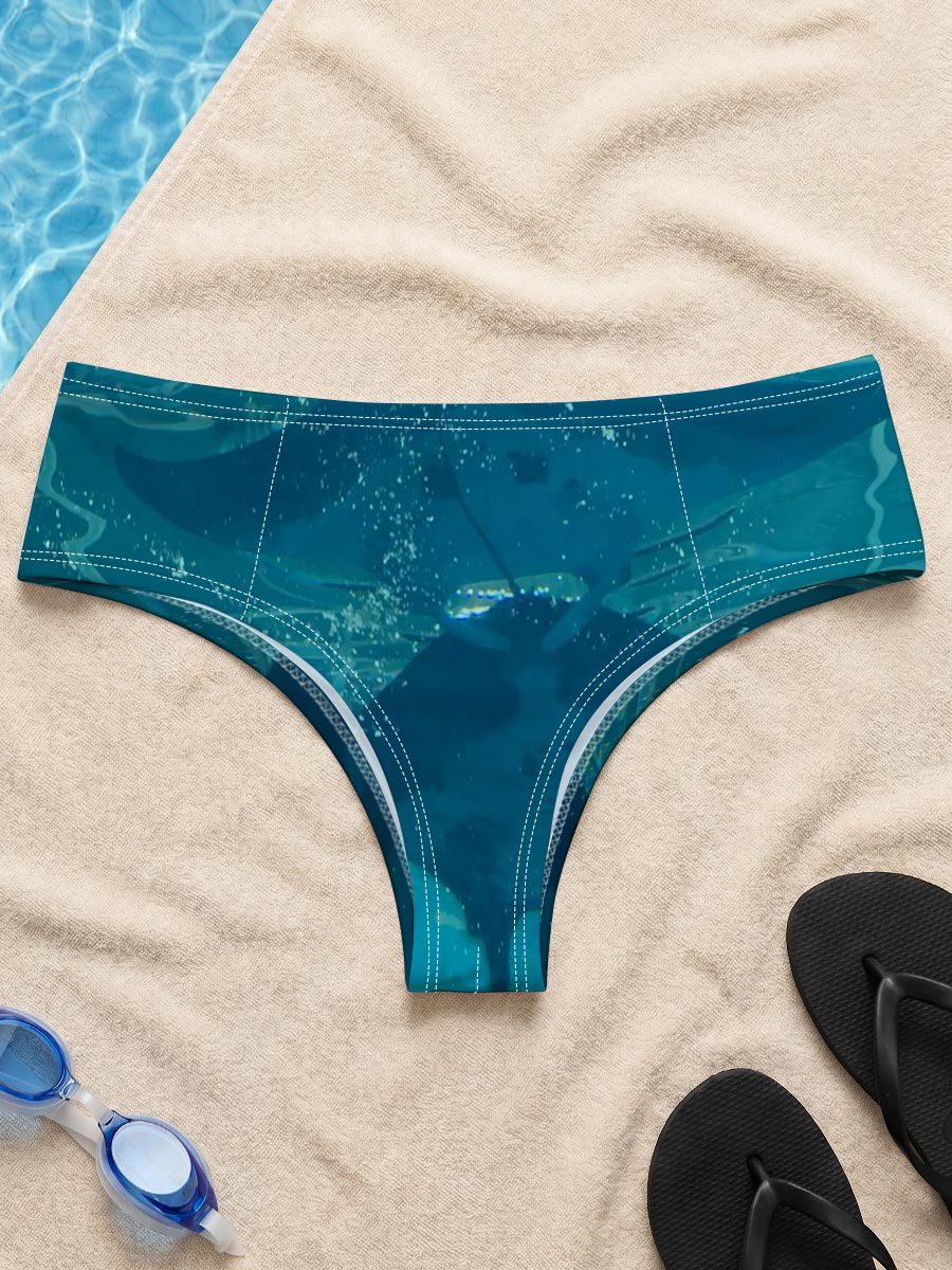 Graceful manta rays glide through clear blue waters, their silhouettes dancing beneath the surface. -  Men's swim trunks