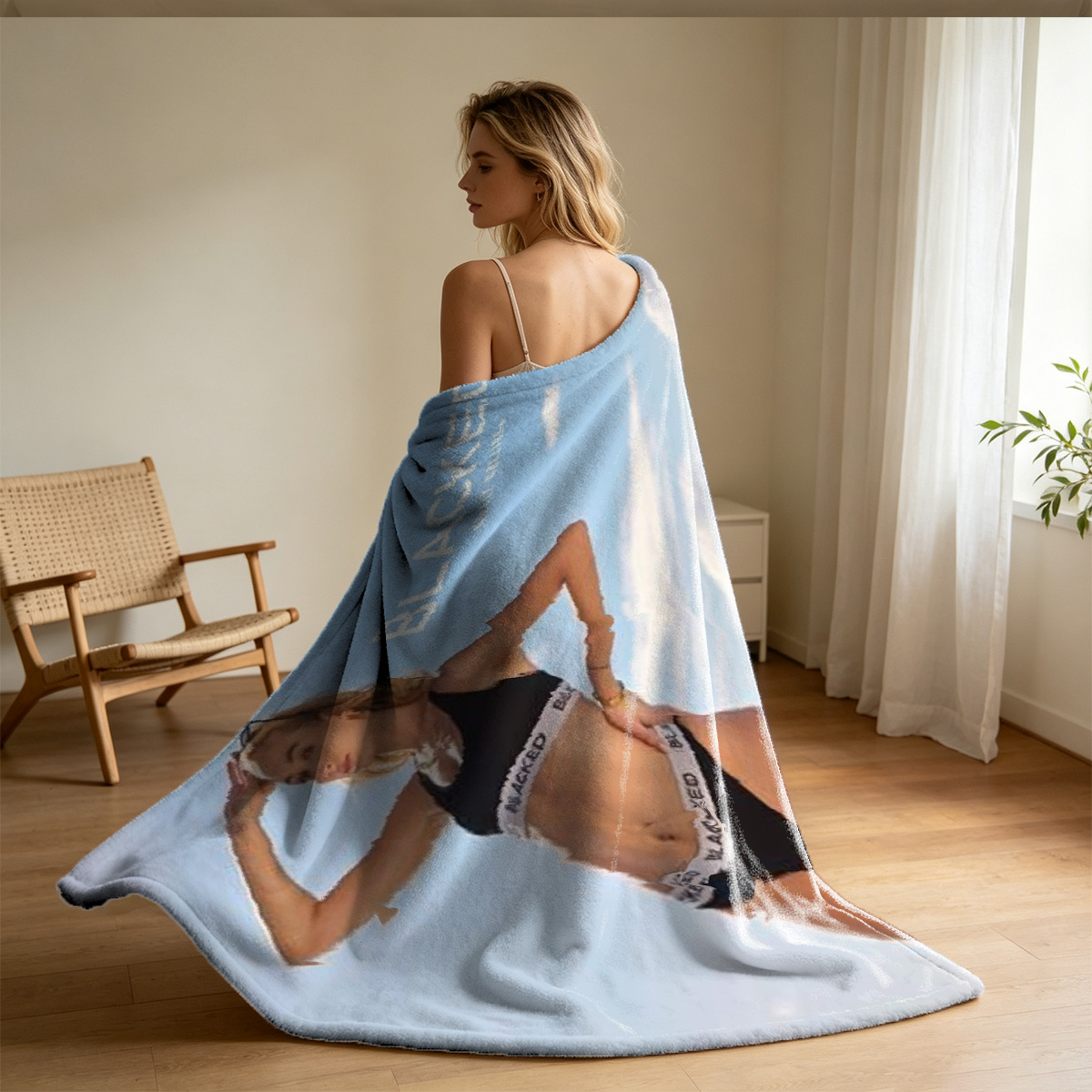Nude blonde in white lingerie kneeling on blue armchair. - Blanket