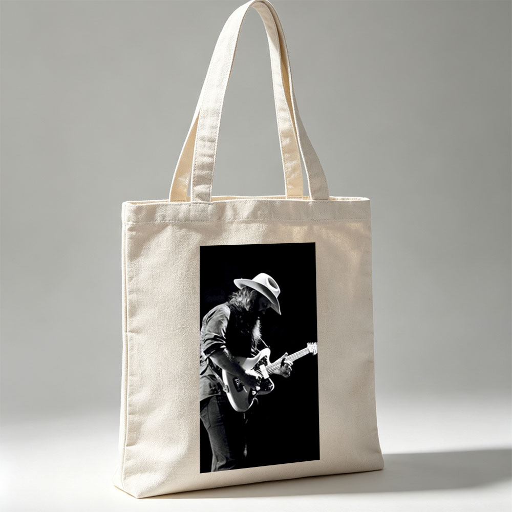 Stevie Ray Vaughan Playing Guitar on Stage in Black and White Photo - Canvas tote bags