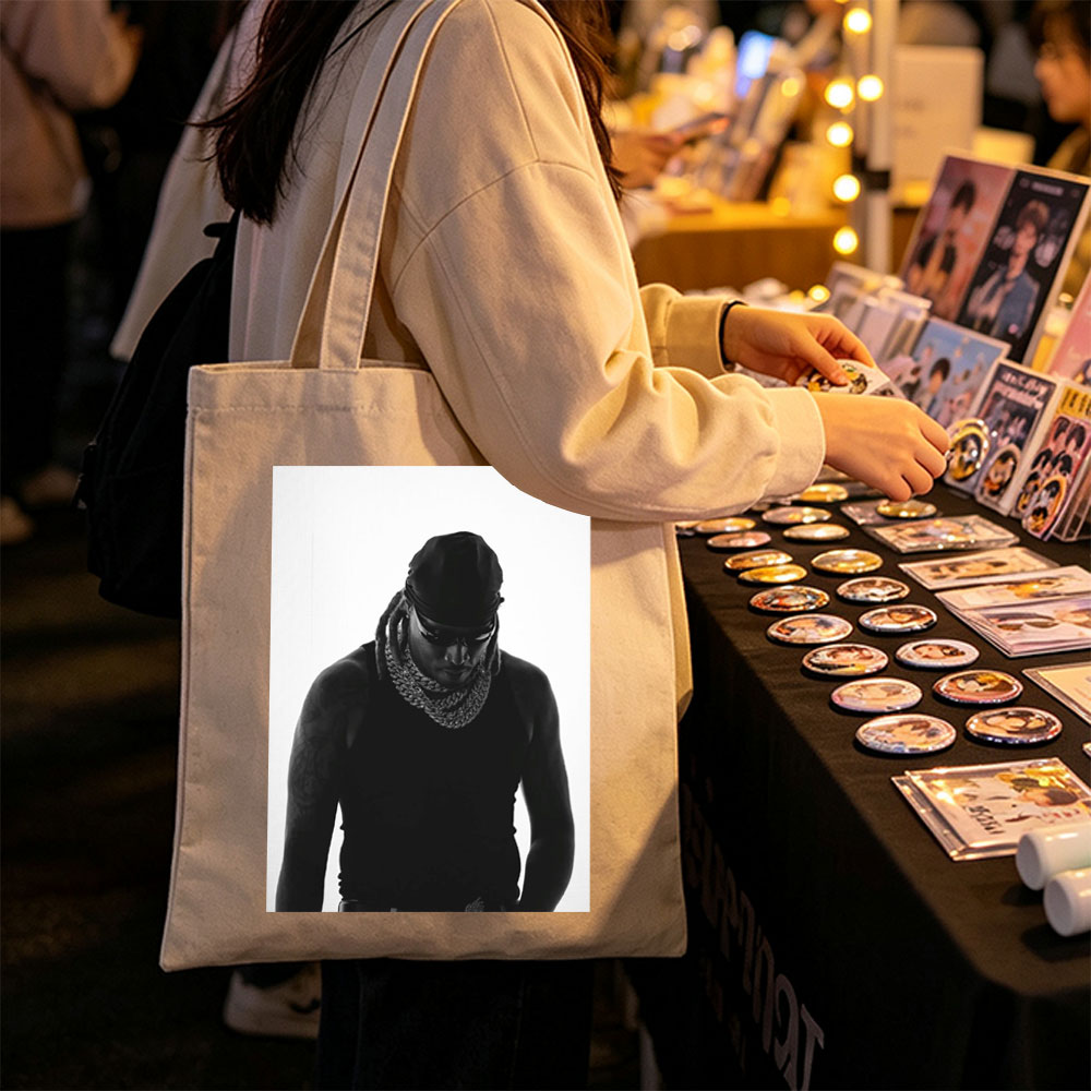 Lil Wayne in a striking black and white portrait wearing a bandana, sunglasses, and a thick chain necklace. - Canvas tote bags