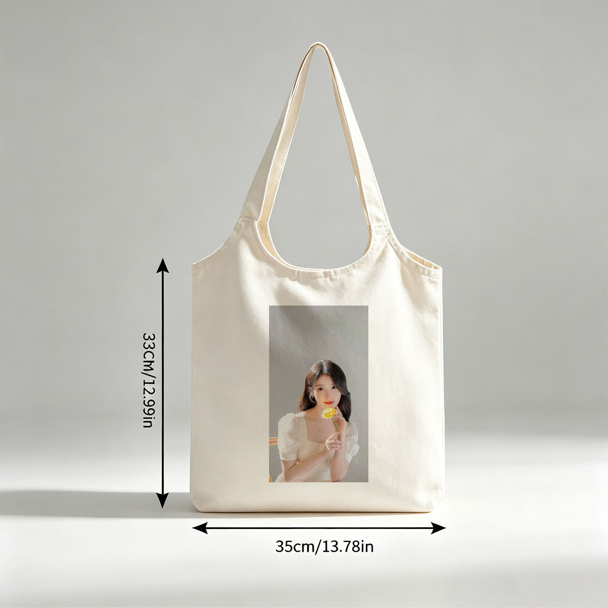 IU Holding a Yellow Rose in a Soft White Dress - Canvas shoulder bags/