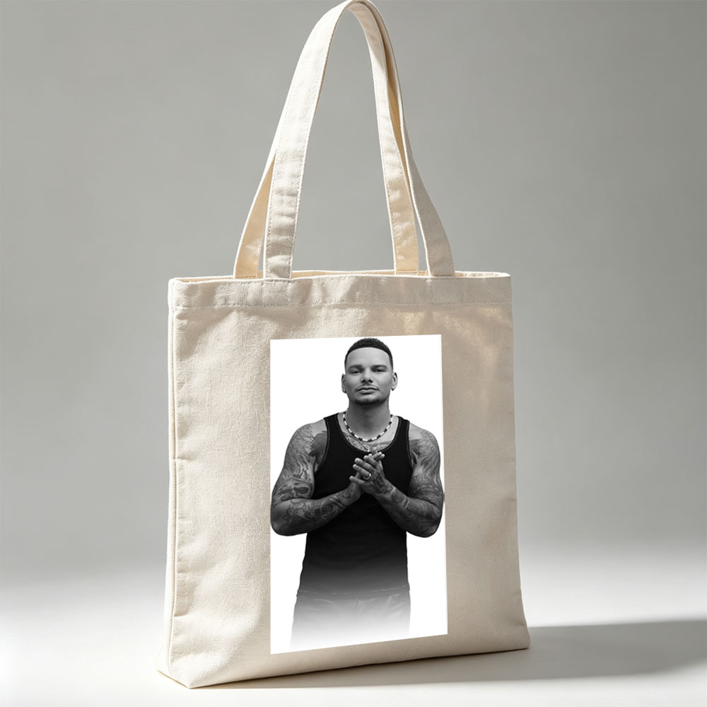 Daddy Yankee Clapping in Black and White Portrait with Tattooed Arms and Beaded Necklace - Canvas tote bags