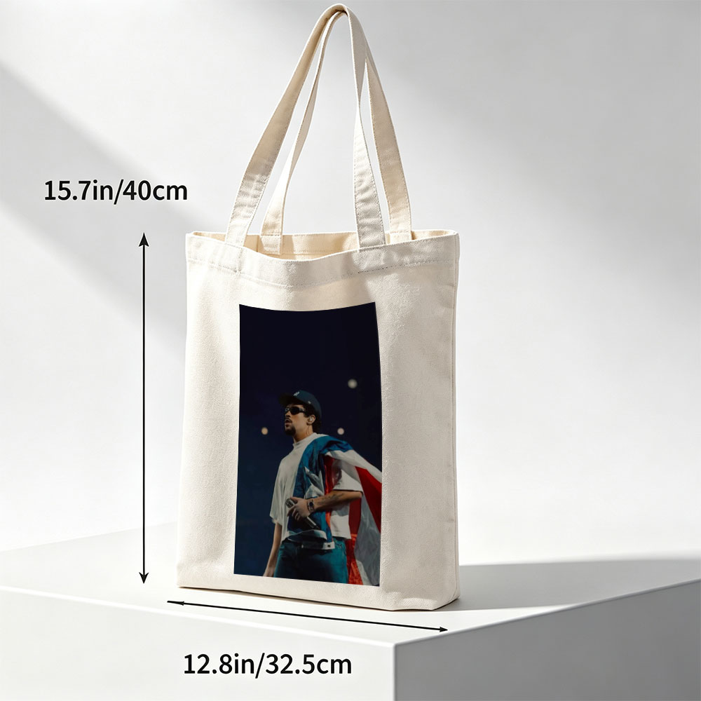 Bad Bunny Performing on Stage with Puerto Rican Flag Draped Over Shoulders - Canvas tote bags